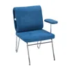 A blue upholstered chair with chrome legs is shown against a white background. Anteprima dell’immagine prodotto