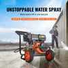 A man is using a pressure washer to clean a wall. The pressure washer is in the foreground. Produktbild-Vorschau