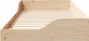 A close-up view of a wooden bed frame with slatted support. Náhled obrázku produktu