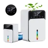 Two white dehumidifiers of different sizes are shown on a white background, with green leaves floating above the larger one.