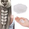 A collage showing a hairstyle created with hair ties and a pile of hair ties. Anteprima dell’immagine prodotto