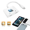 A white USB-C adapter with two ports and a cable, shown with three smartphones. Náhled obrázku produktu