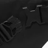 A close-up view of two black plastic buckles on a black fabric surface. Náhľad obrázku produktu