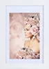 A woman adorned with roses, presented in a white frame. Produktbild-Vorschau