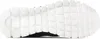 The image shows the bottom view of a black and white shoe sole. Anteprima dell’immagine prodotto