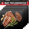 A stack of black grill mats with grilled steaks, garlic, and rosemary on top. Náhled obrázku produktu
