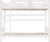A white bunk bed with a ladder and slatted bases for mattresses. Produktbild-Vorschau