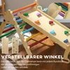 A wooden climbing triangle with a slide and climbing holds, set up indoors. Náhľad obrázku produktu