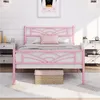 A pink metal bed frame with a cloud-patterned headboard is shown in a bedroom setting. Produktbild-Vorschau