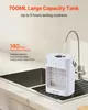 A small white air cooler is being filled with water from a faucet in a kitchen sink. Náhľad obrázku produktu
