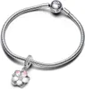A close-up studio shot of a Pandora charm bracelet with a cherry blossom charm. Produktbild-Vorschau