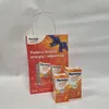 A shopping bag with Pharmaton Geriavit branding and two boxes of Pharmaton Geriavit supplements are displayed against a light gray and white background. Podgląd zdjęcia produktu