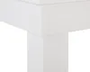 A close-up view of the corner of a white table, showing the leg and the underside of the tabletop. Produktbild-Vorschau