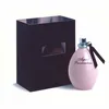 A pink perfume bottle and its black packaging are displayed against a white background. Podgląd zdjęcia produktu