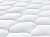 A close-up, detailed view of the quilted surface of a white mattress. Produktbild-Vorschau