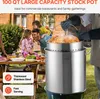 A family is gathered around a table outdoors, with a large stock pot in the foreground. The pot is being used to cook a turkey. Voir les images du produit