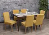 A dining room set with six yellow chairs around a table. Anteprima dell’immagine prodotto