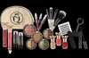 A collection of makeup products arranged on a black background. Produktbild-Vorschau