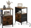 Two industrial-style nightstands with drawers and side pockets are displayed against a white background. Produktbild-Vorschau