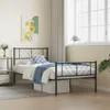 A bedroom scene with a metal bed frame. Podgląd zdjęcia produktu
