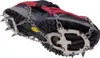 A close-up, angled view of a shoe with crampons attached to the sole. Produktbild-Vorschau