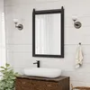 A bathroom vanity with a sink, faucet, and mirror. Podgląd zdjęcia produktu