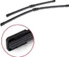 Two black windshield wiper blades are shown on a white background, with a close-up inset of one of the wiper blade connectors. Produktbild-Vorschau