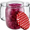 Three glass jars, one filled with purple cabbage and a red polka-dot lid next to it. Two other jars are empty. Anteprima dell’immagine prodotto