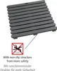 A grey slatted shower mat is shown from a diagonal angle, with a safety icon and text indicating its non-slip feature. Produktbild-Vorschau