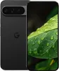 A Google Pixel 9 Pro XL 512GB Obsidian smartphone is shown from the back and front, with the screen displaying a close-up of a green leaf with water droplets. Podgląd zdjęcia produktu