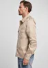 A man is shown from the side wearing a beige long-sleeved shirt and blue jeans. Anteprima dell’immagine prodotto