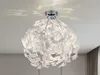A close-up view of a decorative ceiling light fixture. Anteprima dell’immagine prodotto