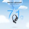 A single black earbud is suspended by strings from two blue balloons against a light blue sky with clouds. Large blue numbers '71' and 'g' are behind the earbud, emphasizing its light weight. Produktbild-Vorschau