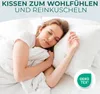 A woman sleeping peacefully on a bed, hugging a pillow. The image has text overlay and a certification logo. Produktbild-Vorschau