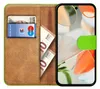 A book-style phone case with slots for cards and cash, shown open with a smartphone inside. Produktbild-Vorschau