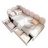 A pink upholstered bed with drawers, shown from a high angle. Podgląd zdjęcia produktu
