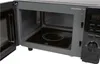 Interior view of an open microwave oven. Produktbild-Vorschau