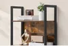 A close-up view of a wooden shelf with decorative items. Produktbild-Vorschau