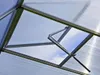 Close-up view of an open vent in a greenhouse roof, showing the sky through the transparent panels and metal frame. Produktbild-Vorschau