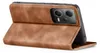 A brown flip cover case for a smartphone is shown standing upright, propped open. Produktbild-Vorschau