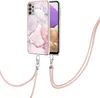 A phone case with a marble pattern and a pink lanyard attached, shown against a white background. Náhled obrázku produktu