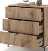 A close-up view of a wooden dresser with three drawers, two of which are partially open. Produktbild-Vorschau