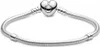 A silver Pandora bracelet with a heart-shaped clasp is displayed on a white background. Náhľad obrázku produktu
