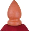 A close-up view of the top of a red umbrella, with a textured orange finial. Produktbild-Vorschau
