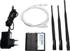 A collection of networking equipment including a router, power adapter, Ethernet cable, and antennas, laid out on a white background. Voir les images du produit