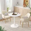 A small round white dining table with two beige chairs in a room with natural light. Anteprima dell’immagine prodotto