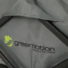 A close-up view of a gray fabric with a logo and text. Produktbild-Vorschau