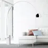 A modern living room with a white sofa, a marble base floor lamp, and sheer curtains. Anteprima dell’immagine prodotto