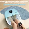 A person's legs are submerged in a blue foot spa on a rug. Anteprima dell’immagine prodotto