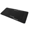Two black floor mats are shown stacked on top of each other against a white background. The mats have the 'Playseat' logo printed on them. Produktbild-Vorschau